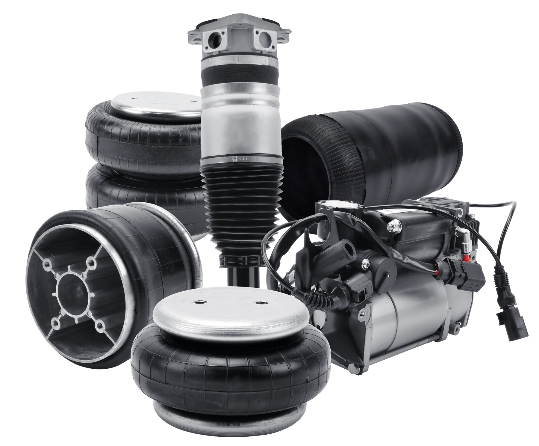 ssortment of air suspension components including air springs, a shock absorber, and an air compressor, arranged against a partially striped gray and white background